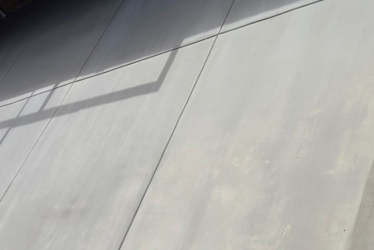 Freshly finished concrete slab with a thickened monolithic edge